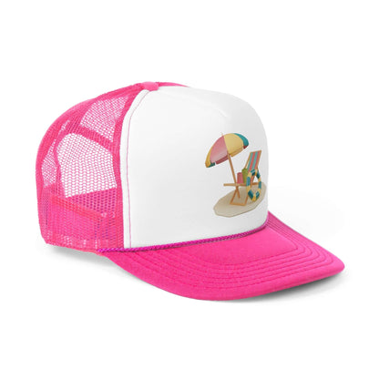 Pink mesh trucker cap featuring a colorful beach scene with an umbrella and lounge chairs. Perfect for sunny days.