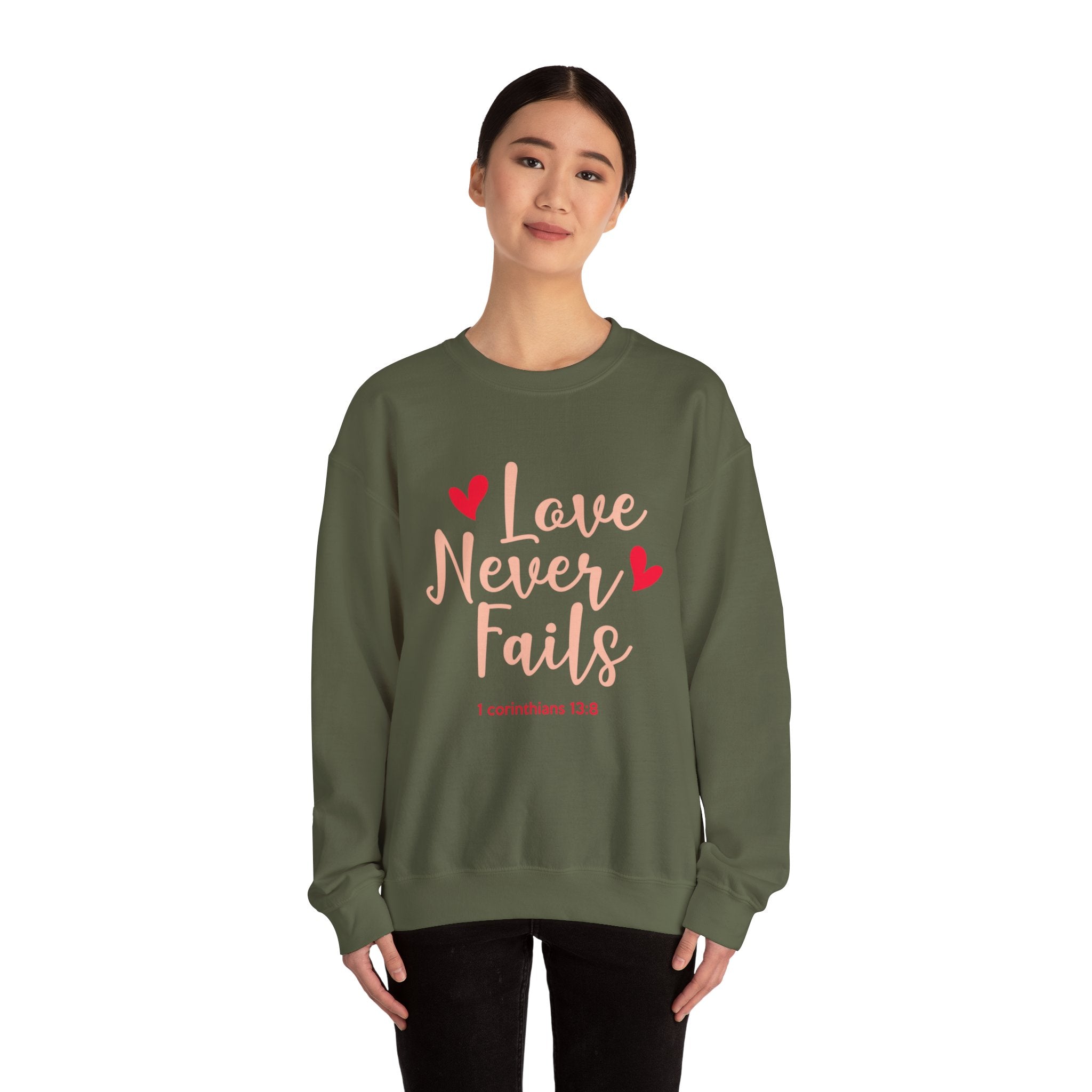 L’amour n’échoue jamais Sweatshirt unisexe 