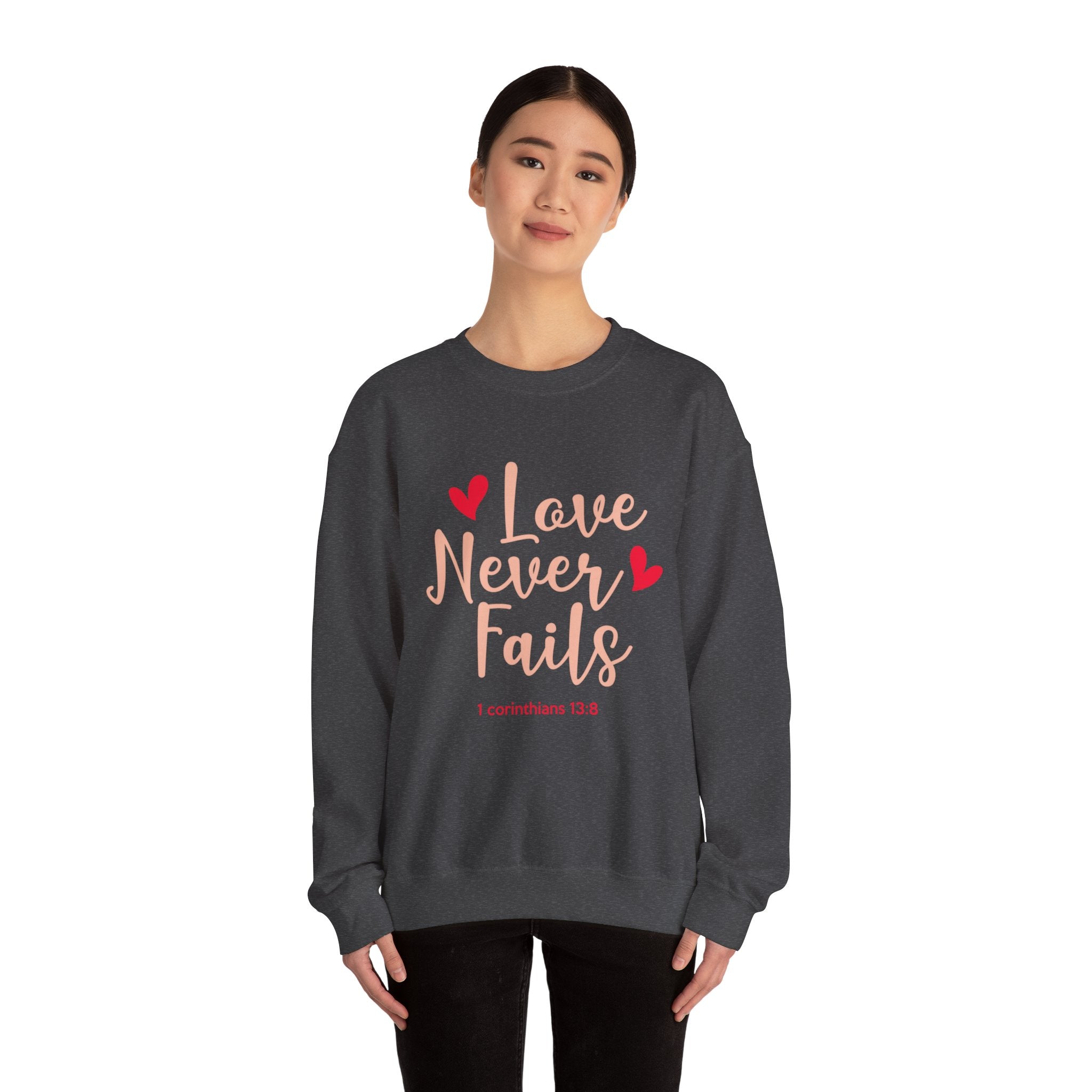 L’amour n’échoue jamais Sweatshirt unisexe 