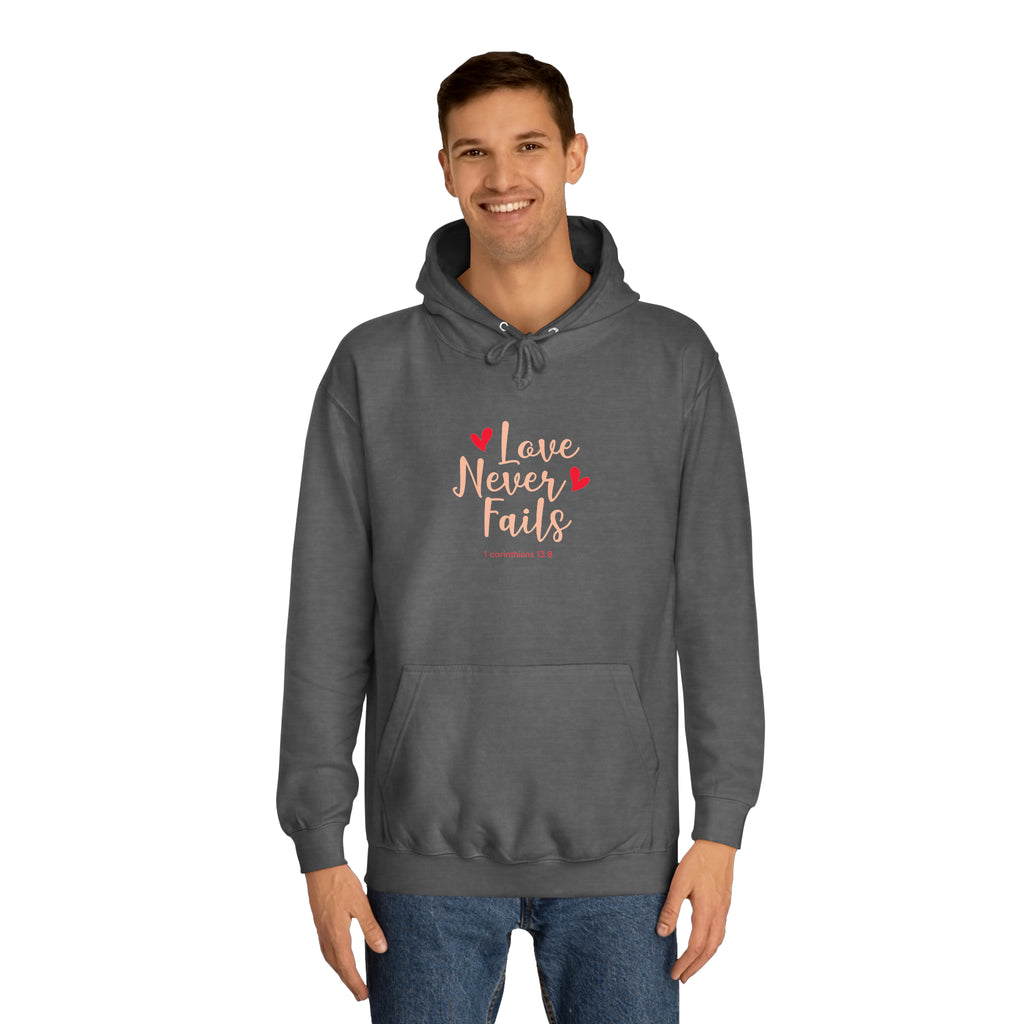 L’amour n’échoue jamais Sweat à capuche unisexe 