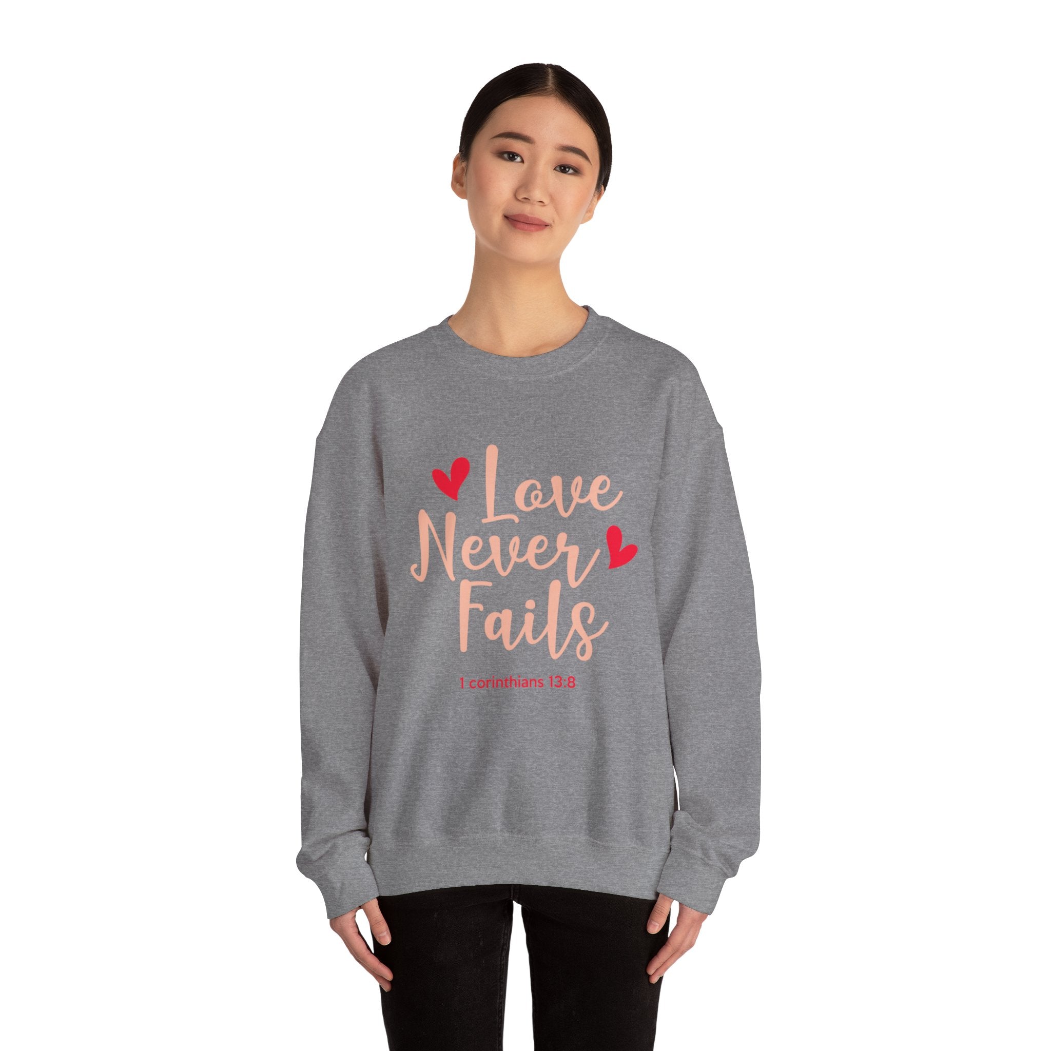 L’amour n’échoue jamais Sweatshirt unisexe 