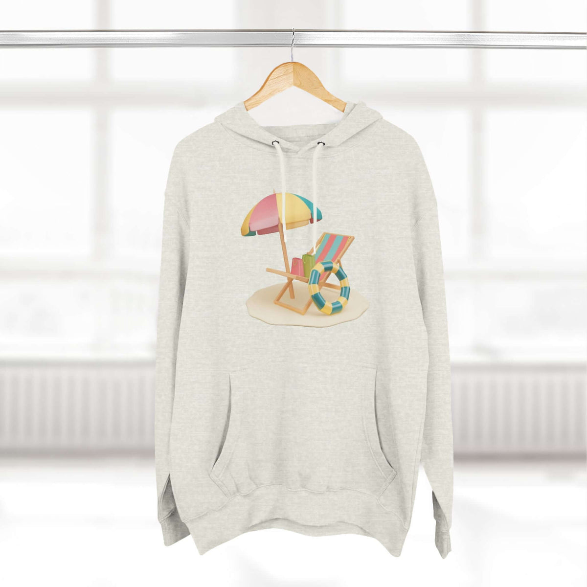 Sunny Resort Hoodie featuring a beach scene graphic with an umbrella and chair, perfect for a relaxed, stylish look.
