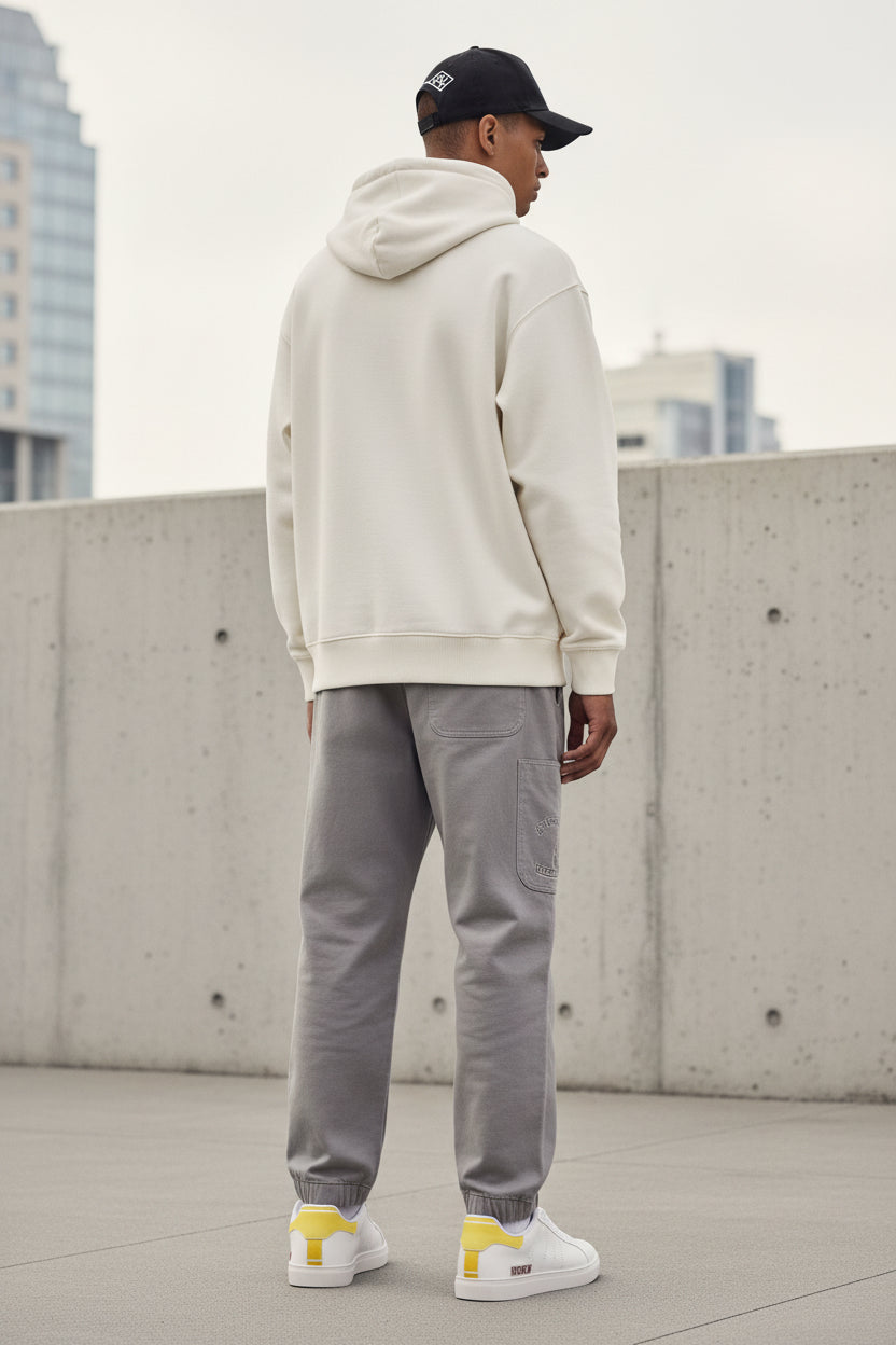 Leather Low-Top Sneakers — Classic White with Yellow Heel Accent