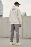 Leather Low-Top Sneakers — Classic White with Yellow Heel Accent