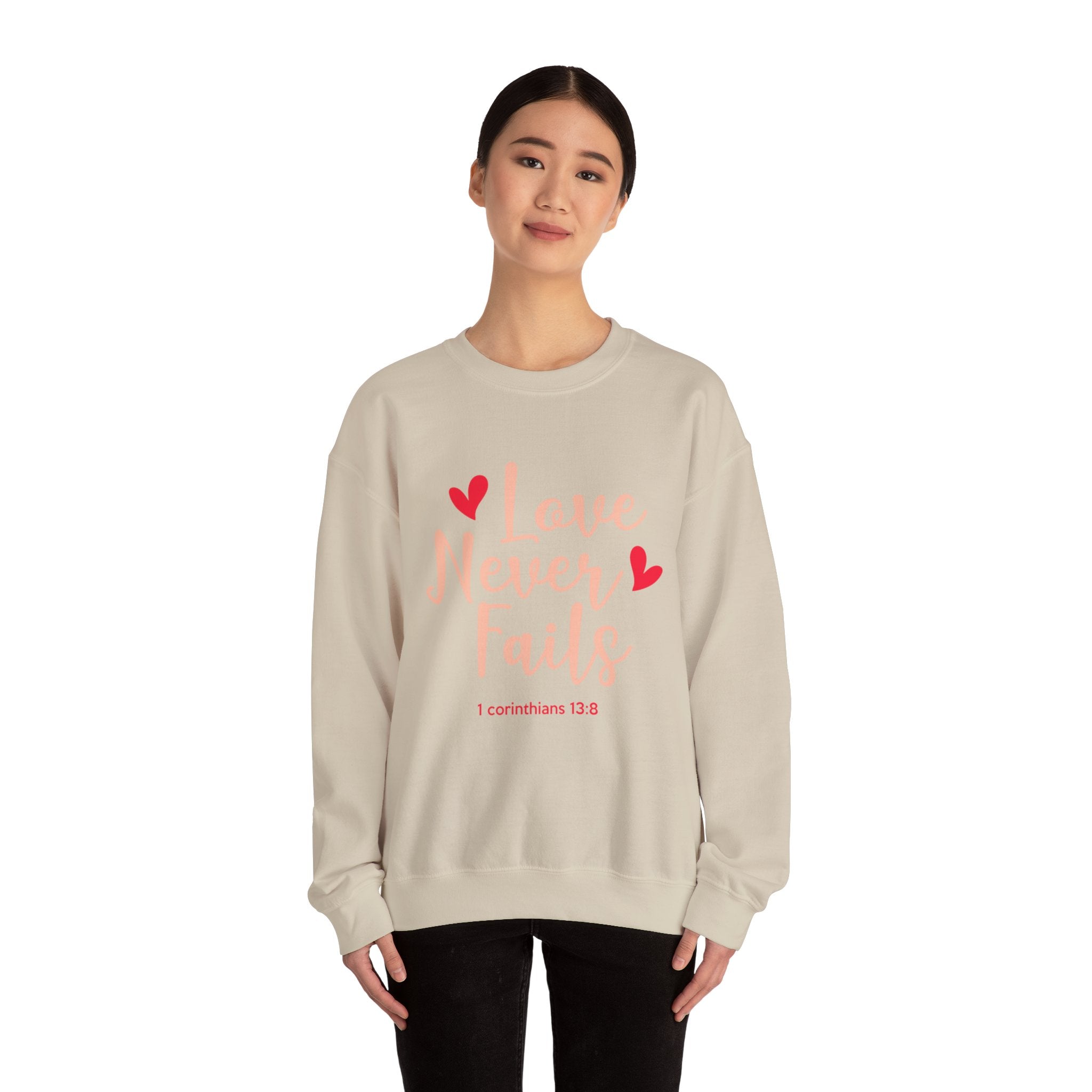 L’amour n’échoue jamais Sweatshirt unisexe 