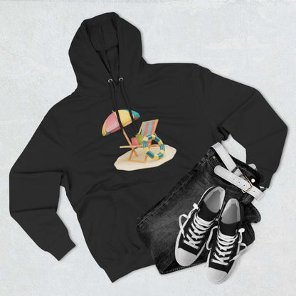 Black Sunny Resort Hoodie featuring a beach chair and umbrella design, paired with casual sneakers and denim.