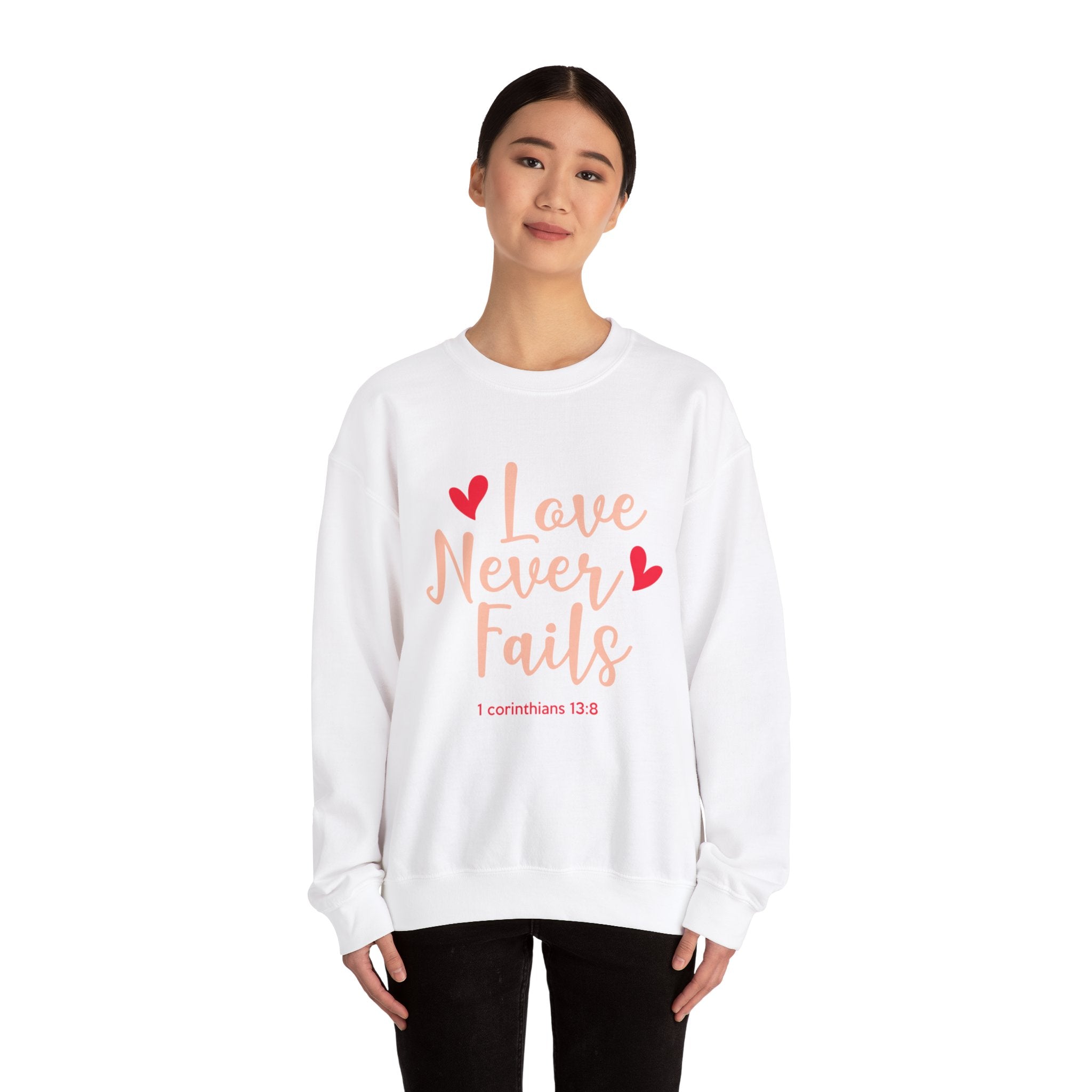 L’amour n’échoue jamais Sweatshirt unisexe 