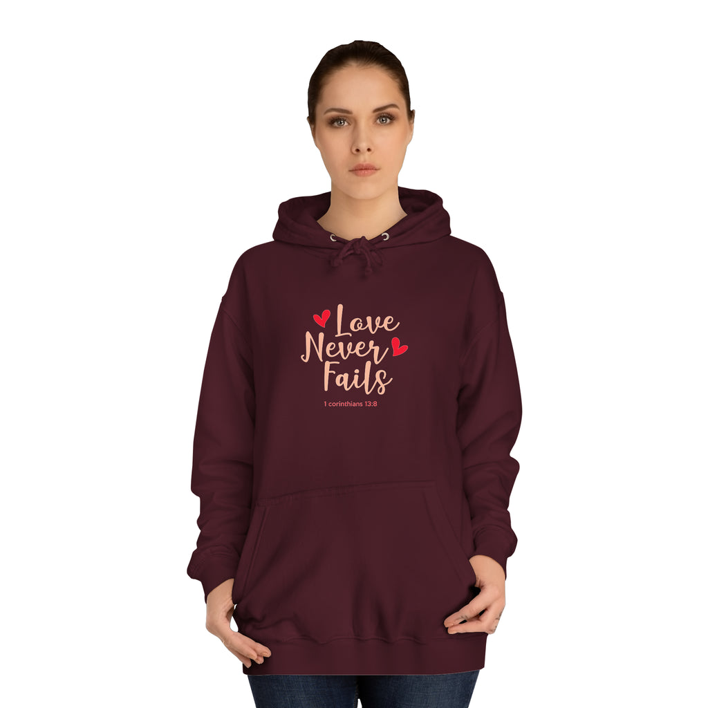 L’amour n’échoue jamais Sweat à capuche unisexe 