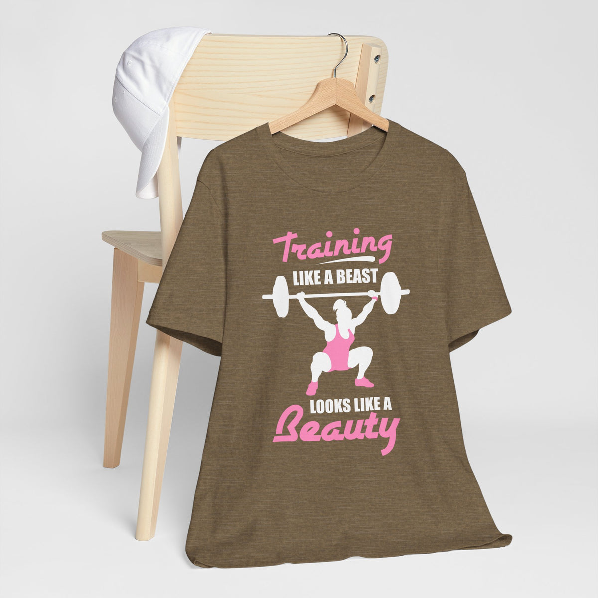 S’entraîner comme une bête ressemble à un tee-shirt unisexe de beauté 