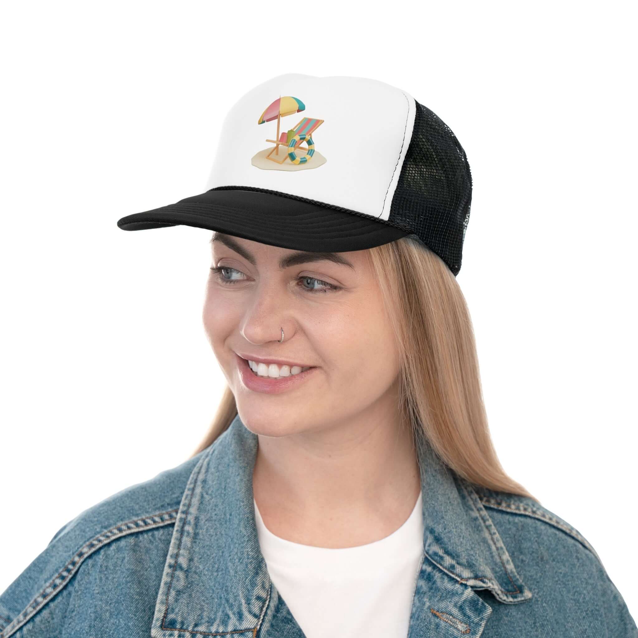 Woman wearing RC'nSONS Sunny Resort Trucker Cap with beach umbrella design, showcasing vibrant summer style.