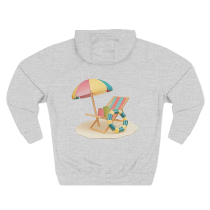 Sunny Resort Hoodie featuring colorful beach chair and umbrella print, perfect for a relaxed and stylish look.