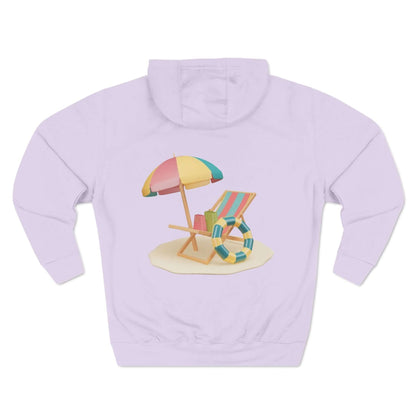 Sunny Resort Hoodie with colorful beach umbrella and lounge chair design on a soft purple background.