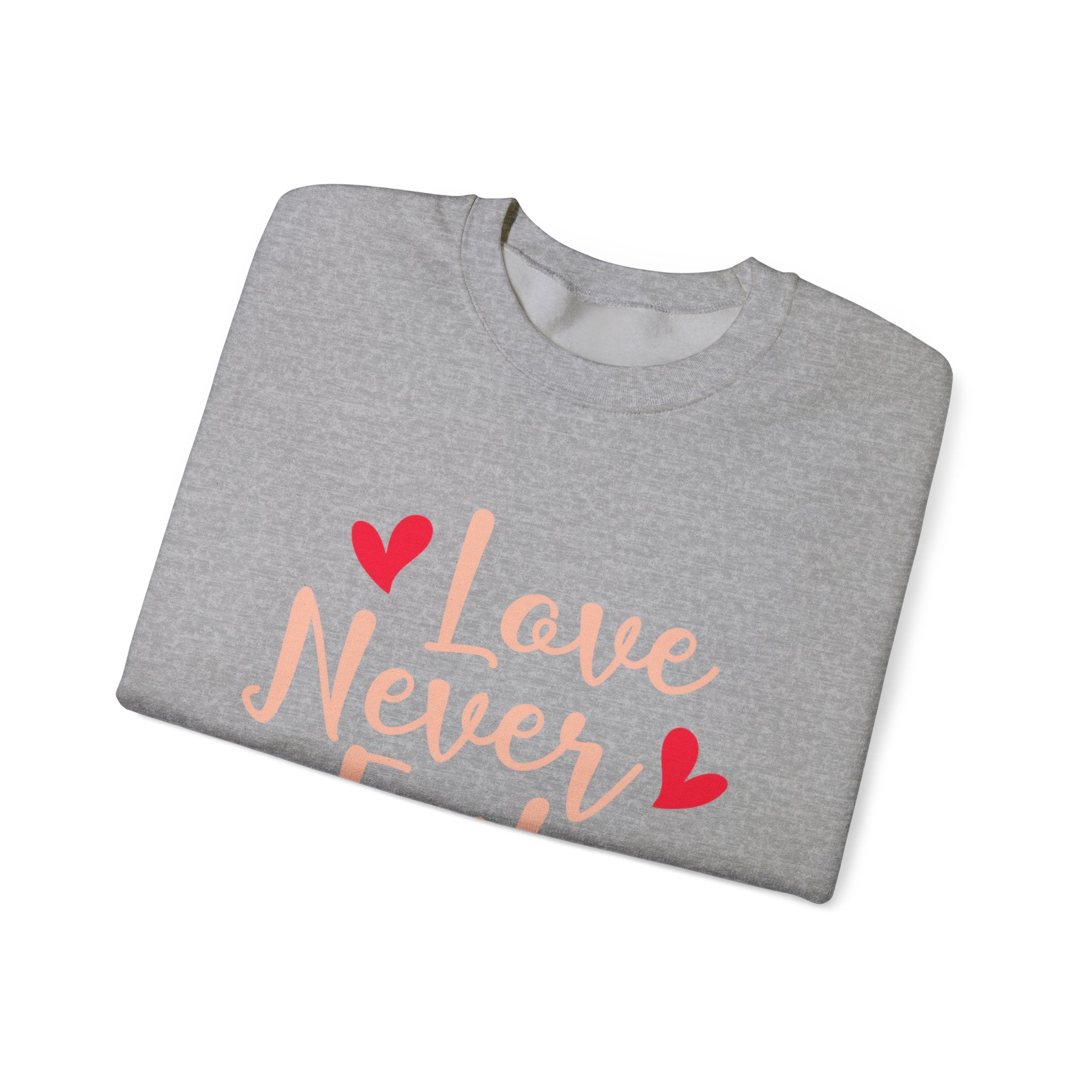 L’amour n’échoue jamais Sweatshirt unisexe 