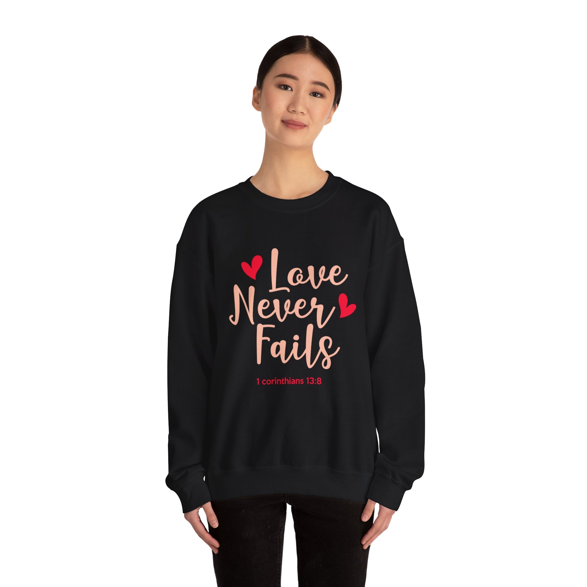 L’amour n’échoue jamais Sweatshirt unisexe 
