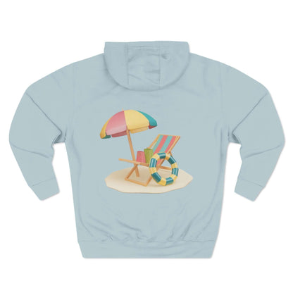 Back view of Sunny Resort Hoodie featuring a colorful beach scene with umbrella and lounge chair.