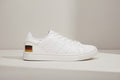 White Leather Low-Top Sneakers with Minimal German Flag Accent